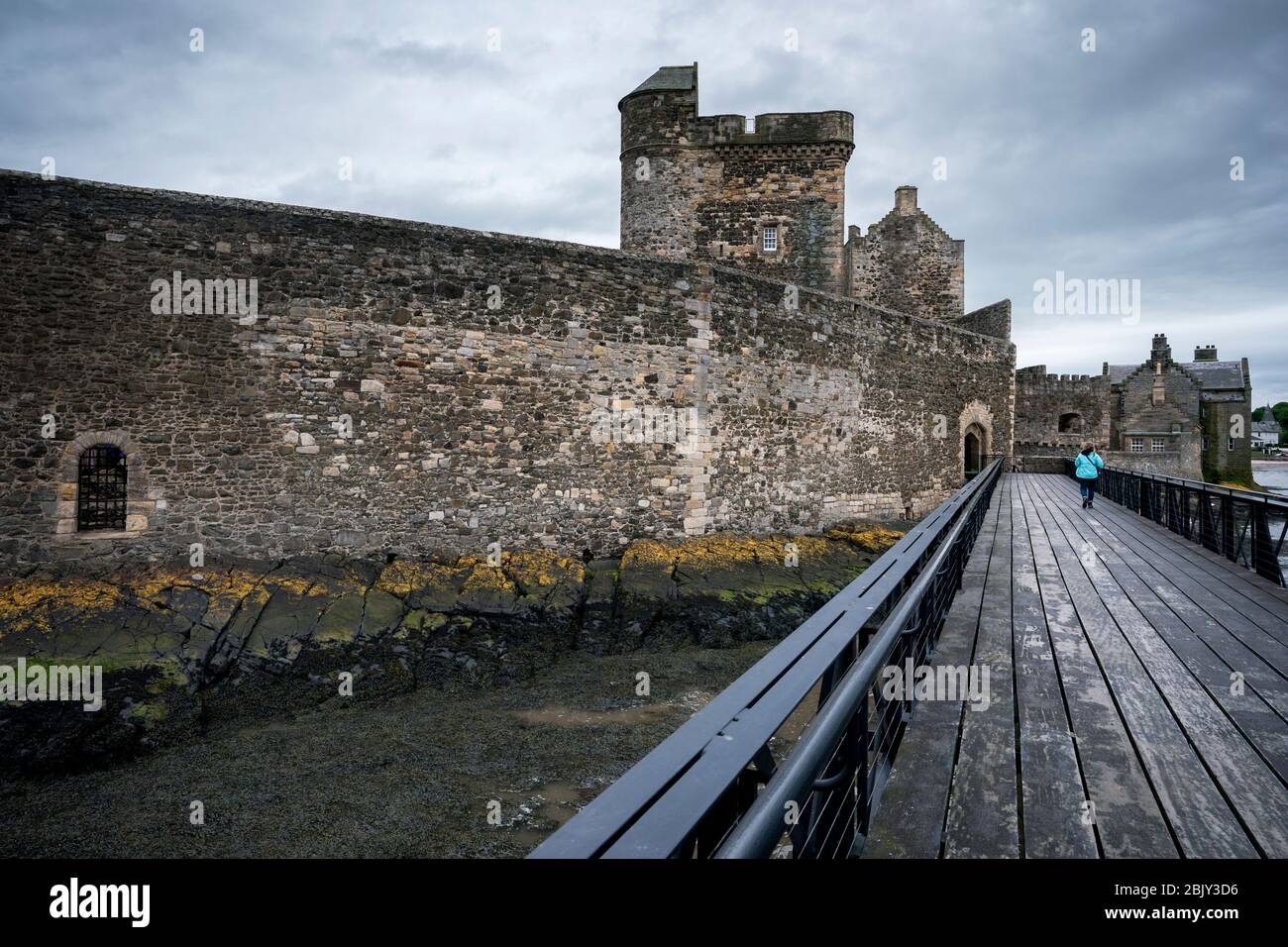 Blackness Castle built by Sir George Crichton in the 1440s, sits on the edge of the sea on the Firth of Forth. This fortress resembles a stone ship. Stock Photo