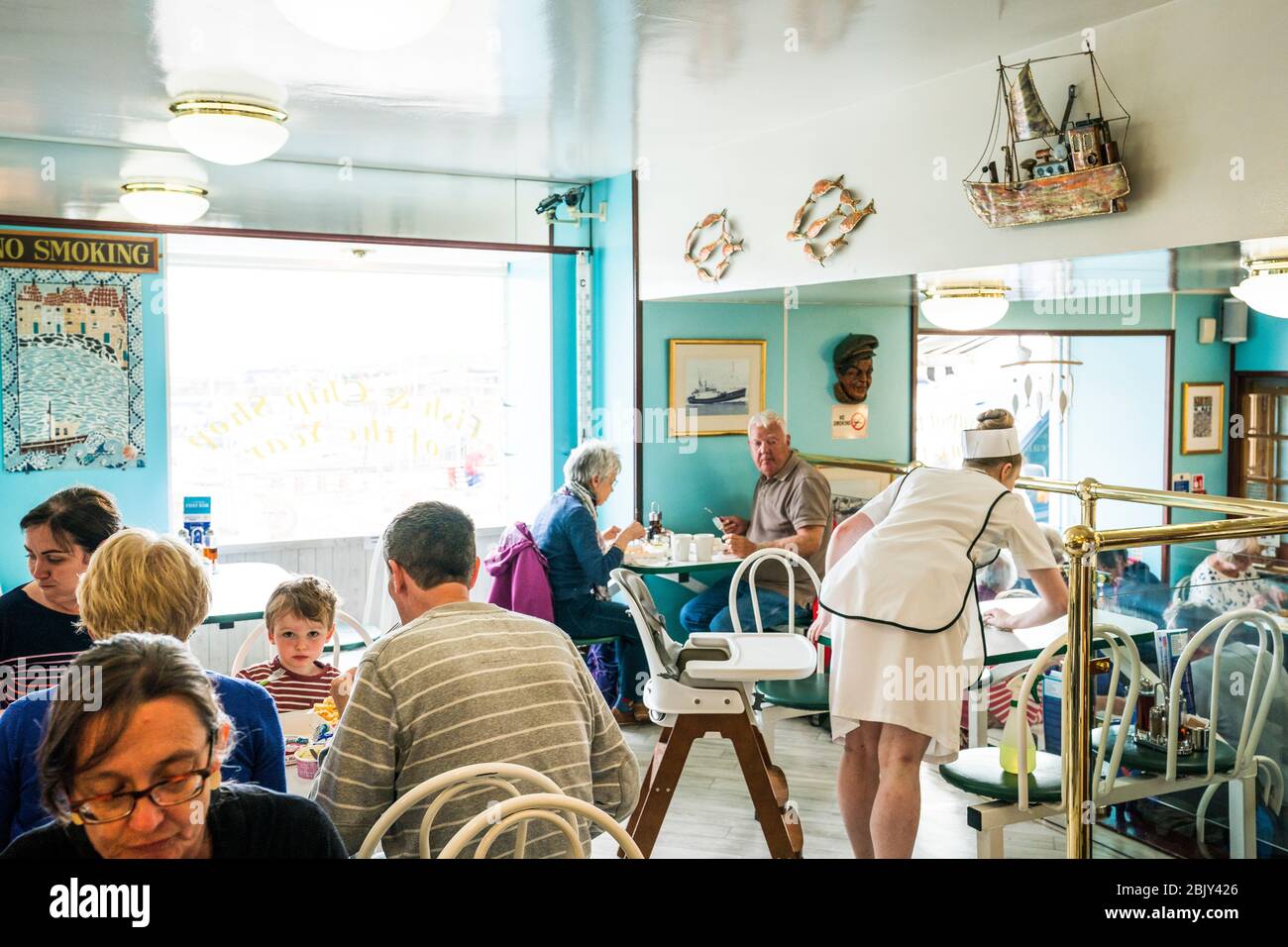 Tourists and locals dining in the famous Anstruther Fish Restaurant, Fishing village, Anstruther, Kingdom of Fife, Scotland, Europe Stock Photo