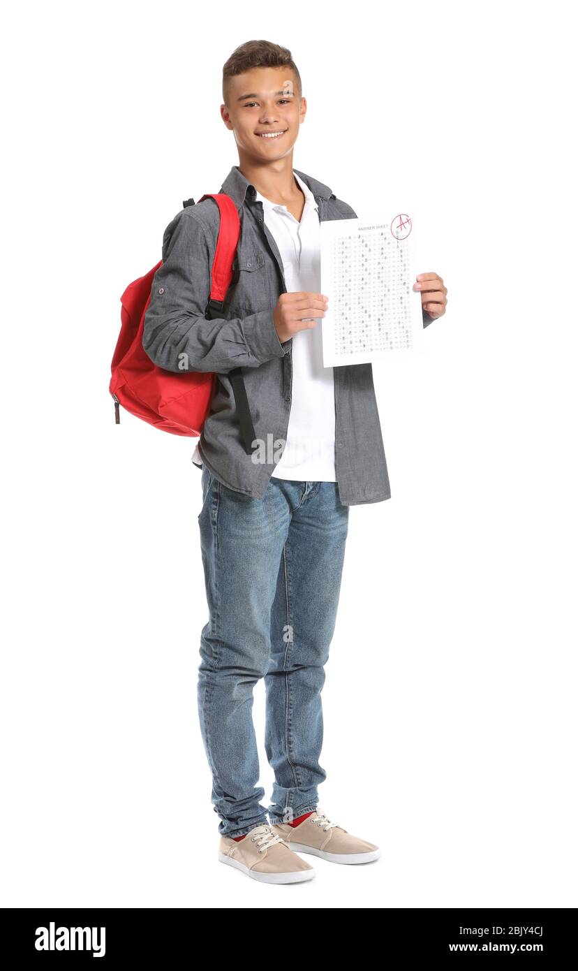 Boy Test Background Happy boy with results of school test on white background Stock Photo ...