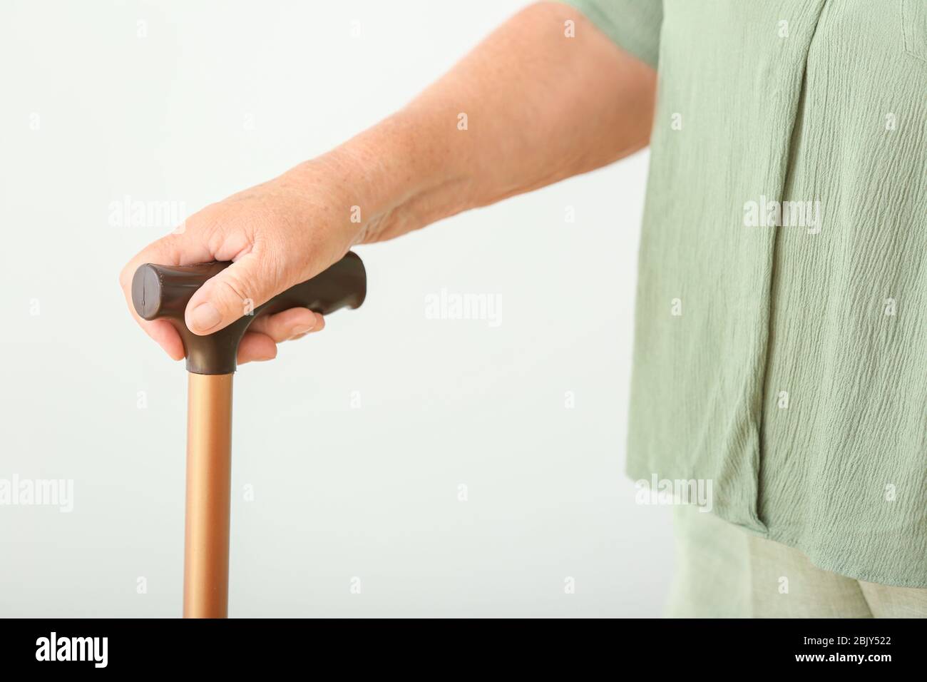 Elderly woman walking stick on hi-res stock photography and images - Alamy