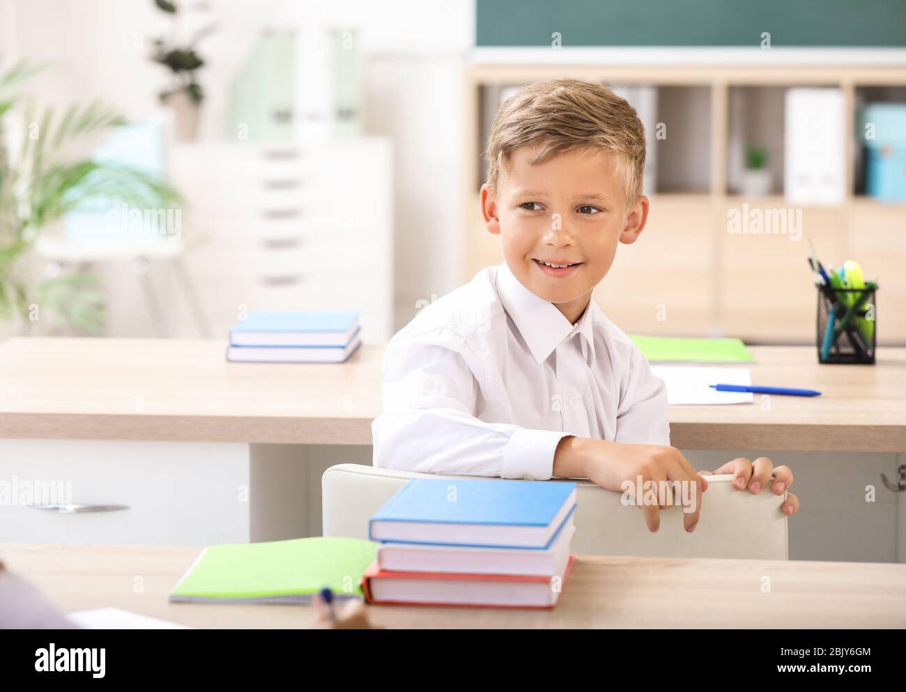 Pupils during lesson in classroom Stock Photo
