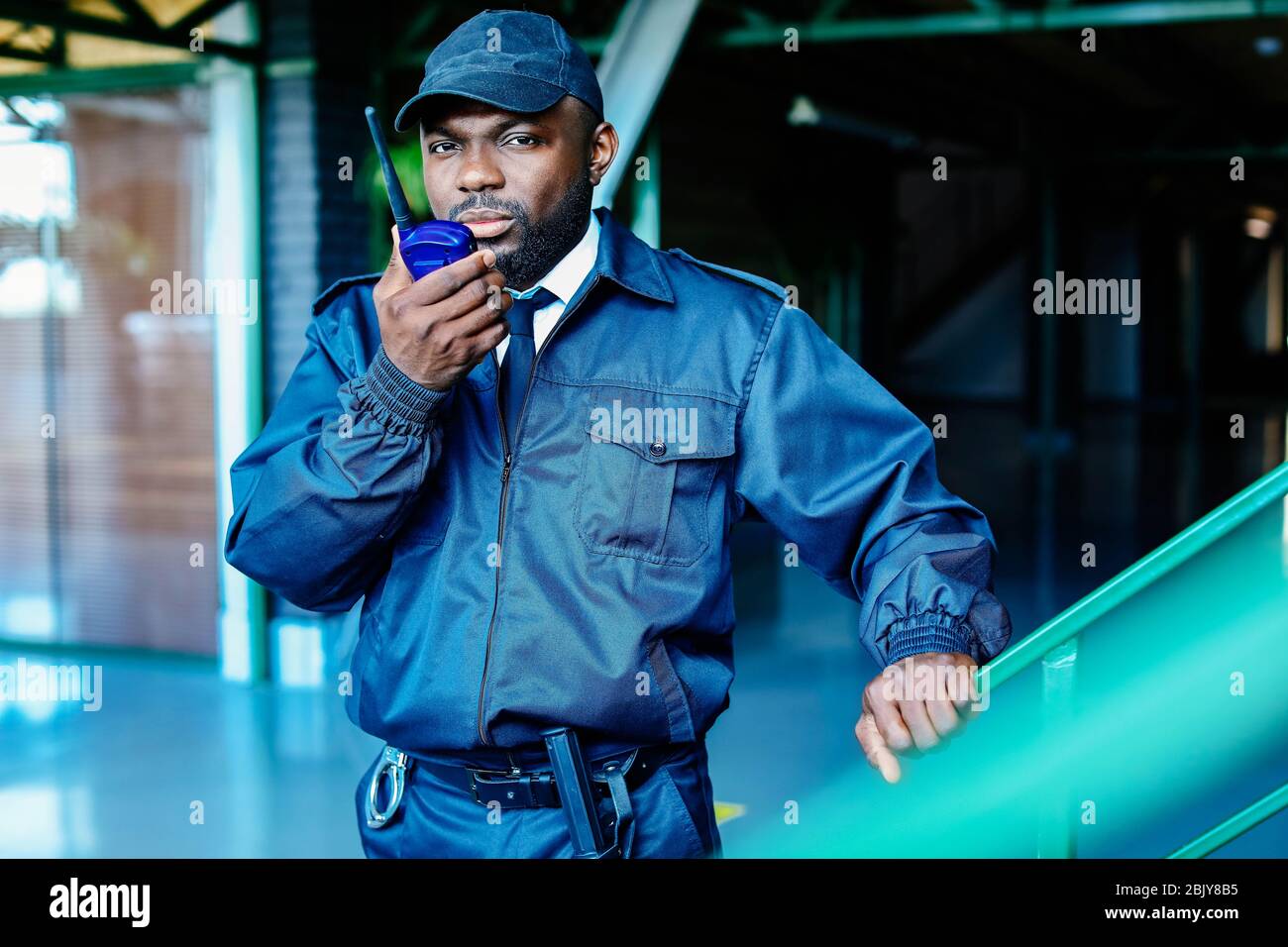 African-American security guard in building Stock Photo - Alamy