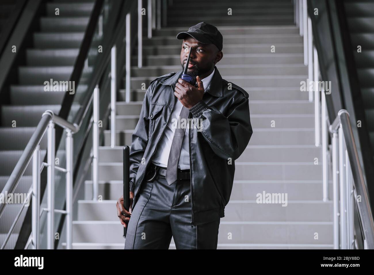 African-American security guard in building Stock Photo - Alamy