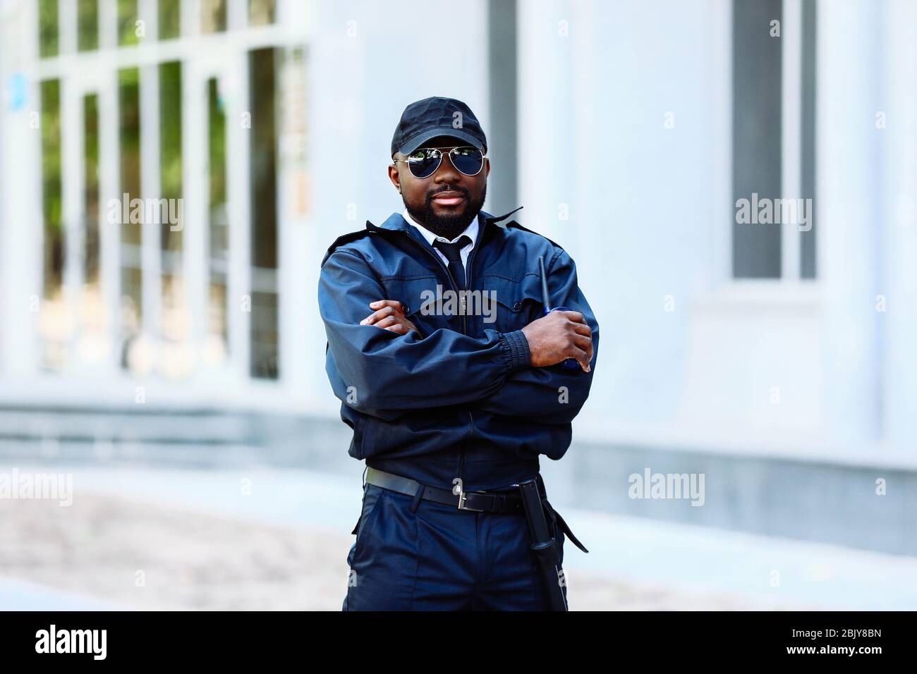 African-American security guard outdoors Stock Photo - Alamy