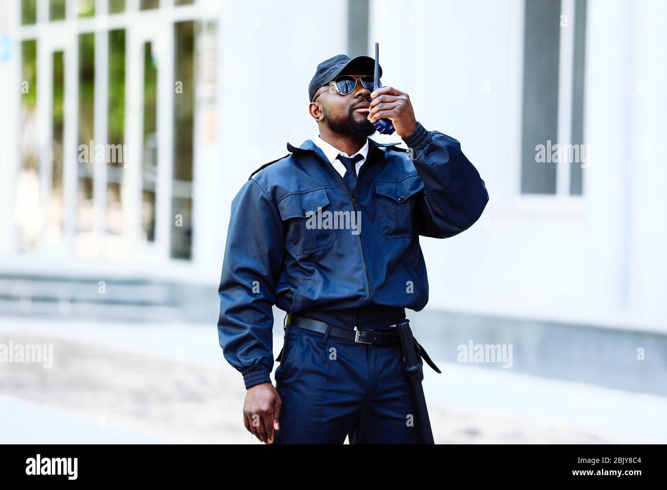 African-American security guard outdoors Stock Photo - Alamy