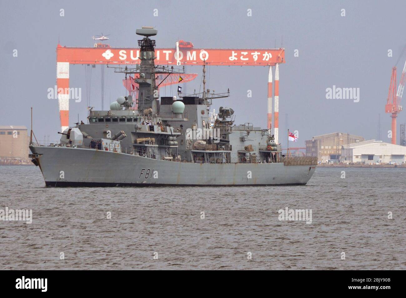 HMS Sutherland (F81) arrives at U.S. Fleet Activities Yokosuka, Japan, for a port visit on 11 April 2018 (180411 Stock Photo