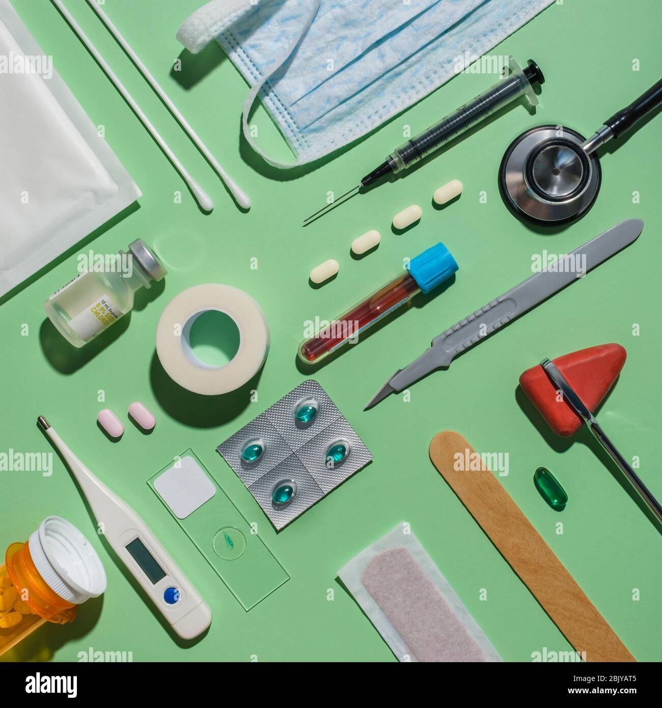 Medical supplies on green background Stock Photo