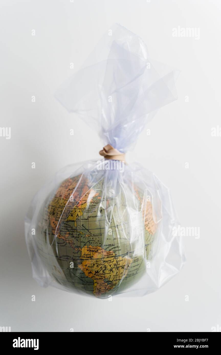 Earth globe in plastic bag Stock Photo