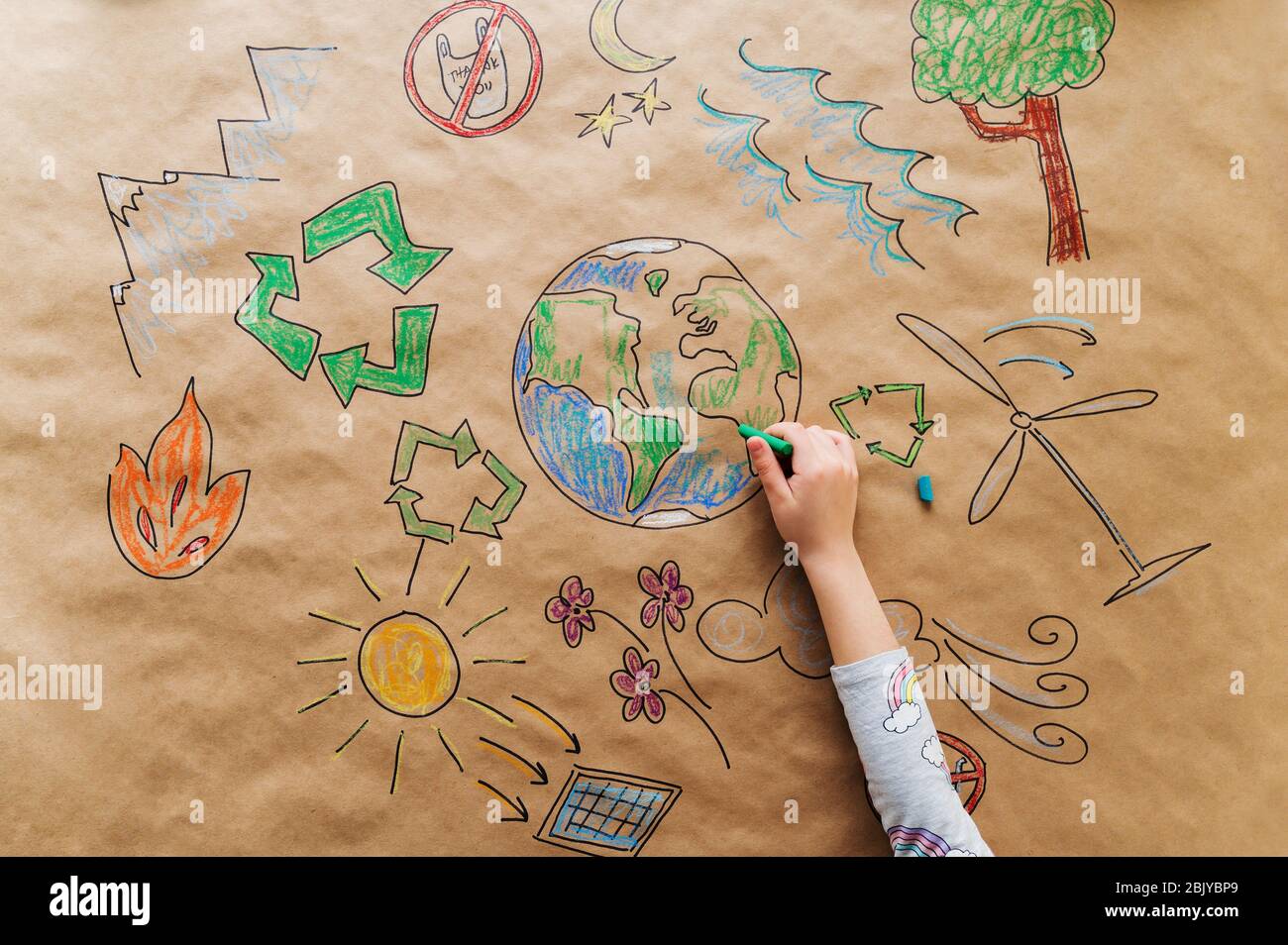Girl drawing eco friendly posterÂ Stock Photo