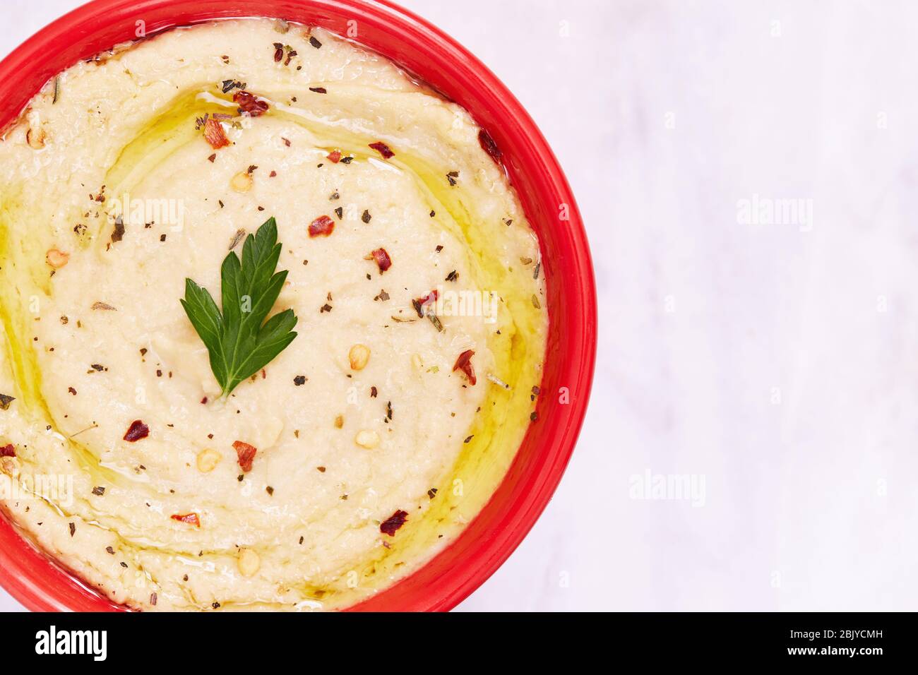 Bowl of hummus Stock Photo Alamy