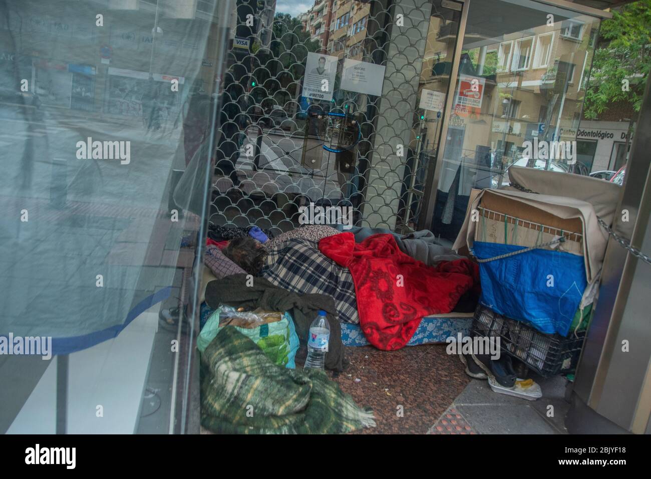Madrid, Spain. 30th Apr 2020. Homeless people on the street during the ...