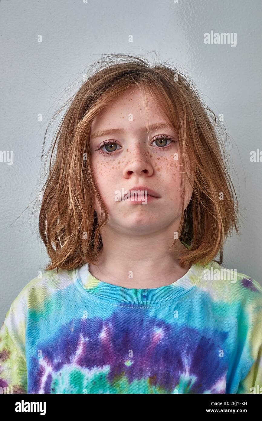 Portrait of child in colorful shirt Stock Photo