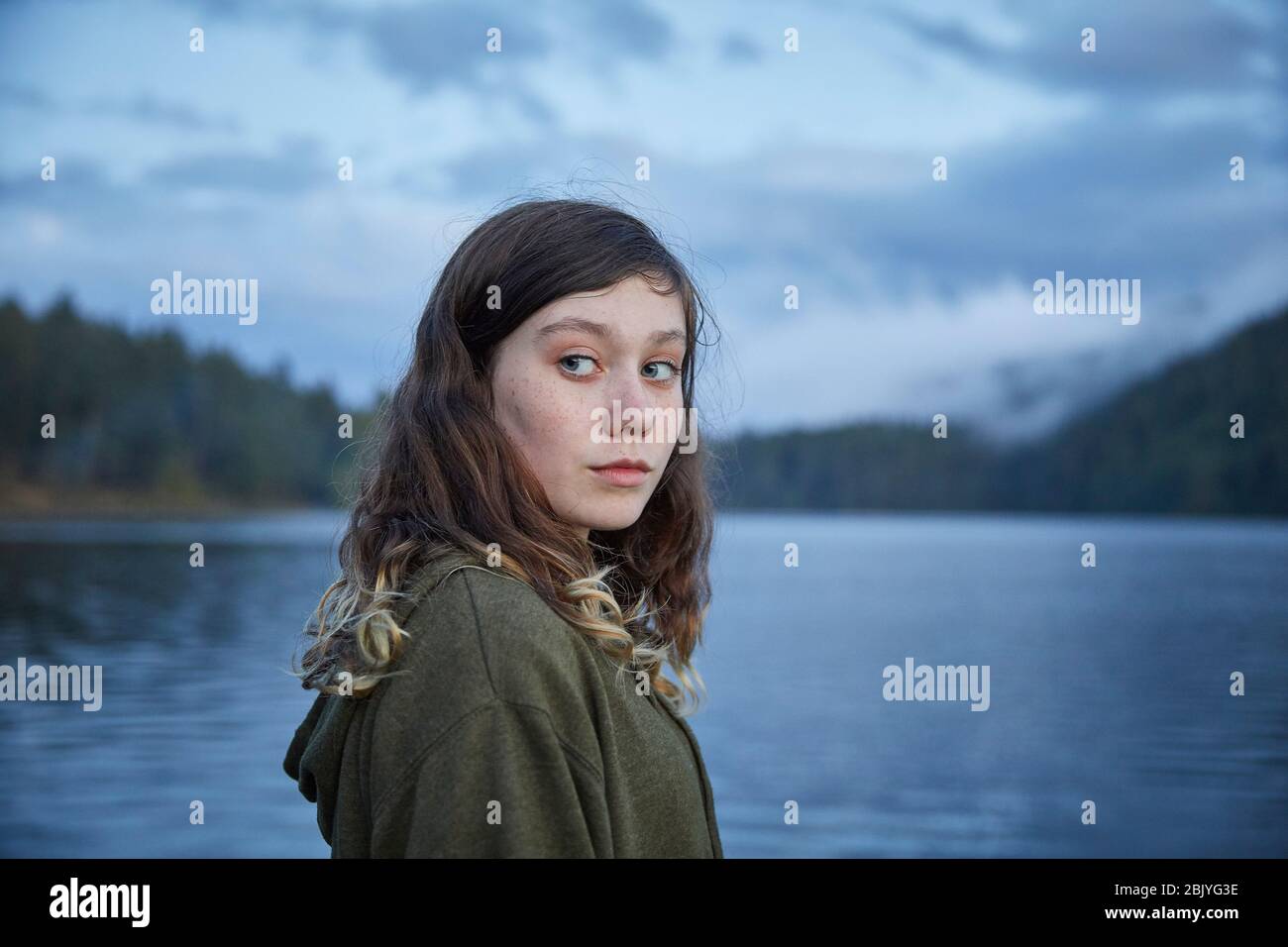 Portrait of girl by lake Stock Photo