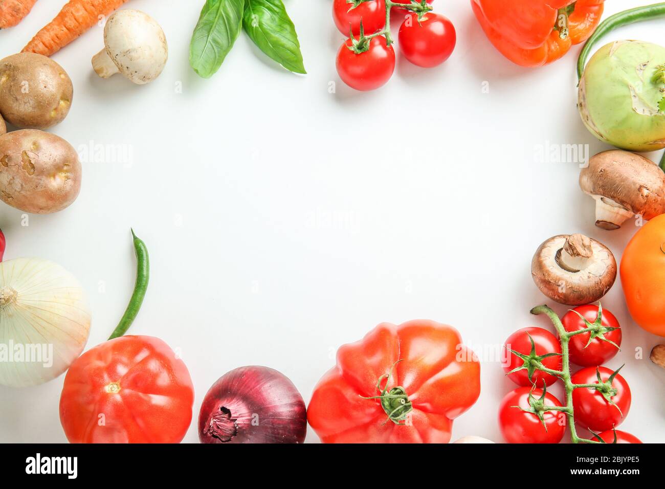 Frame made of different fresh vegetables on white background Stock ...