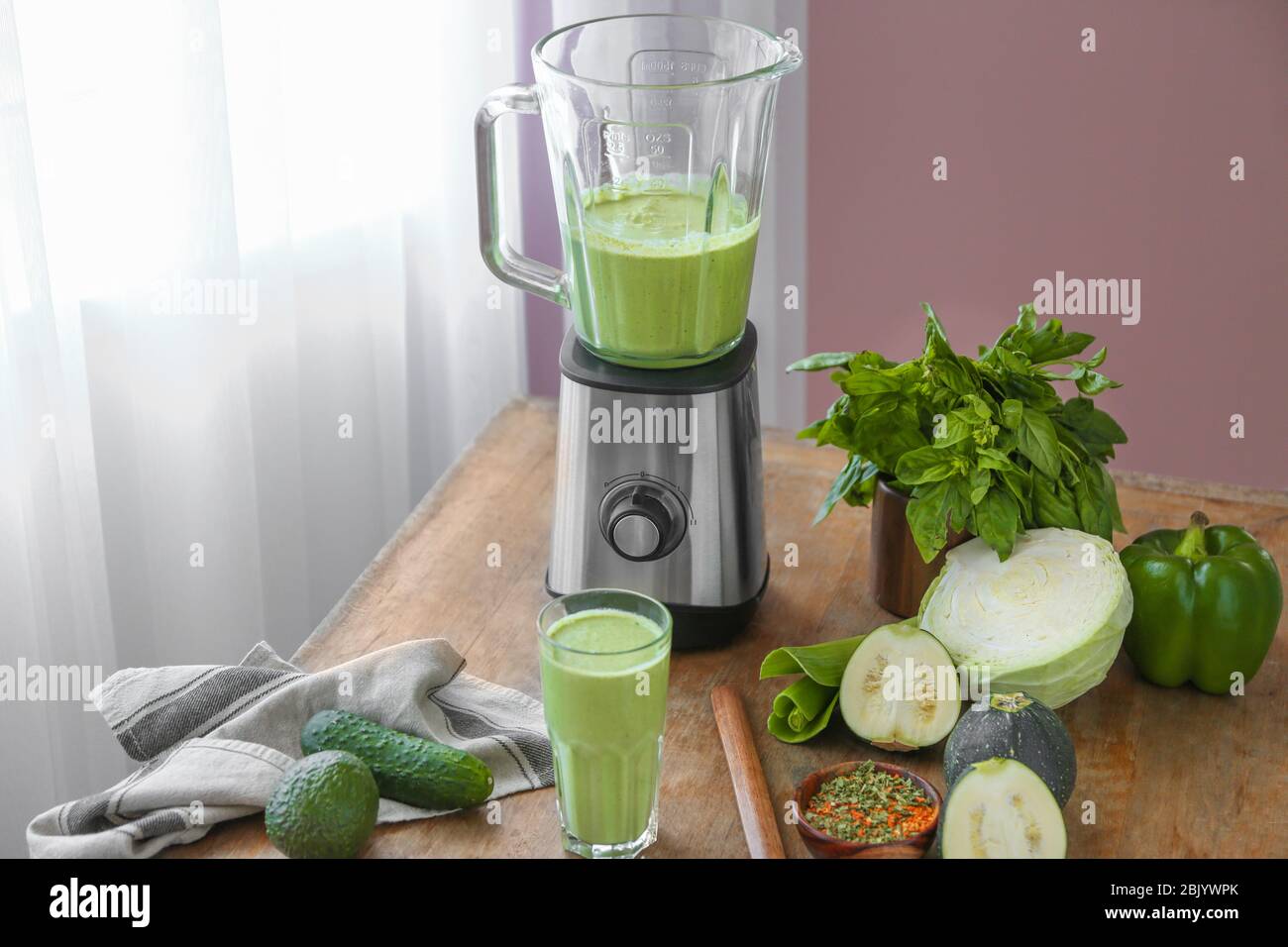 Preparing Of Tasty Smoothie With Blender In Kitchen Stock Photo Alamy