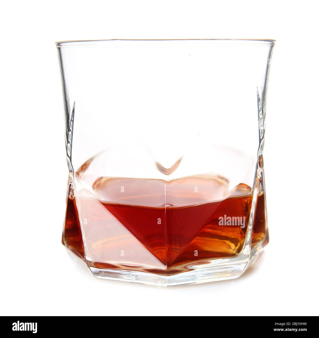 Glass of whiskey on white background Stock Photo