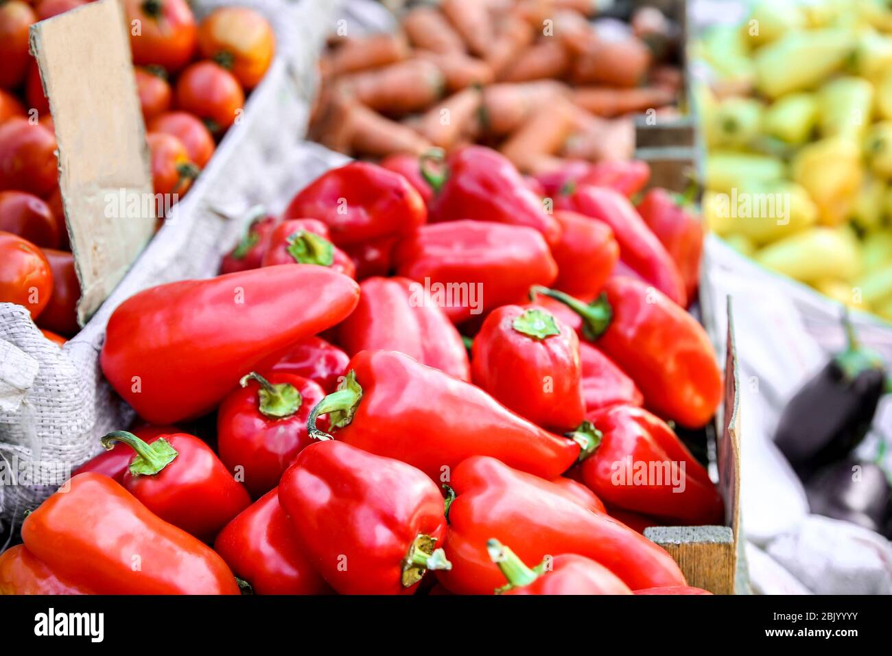 Fresh peppers on counter at market Stock Photo Alamy