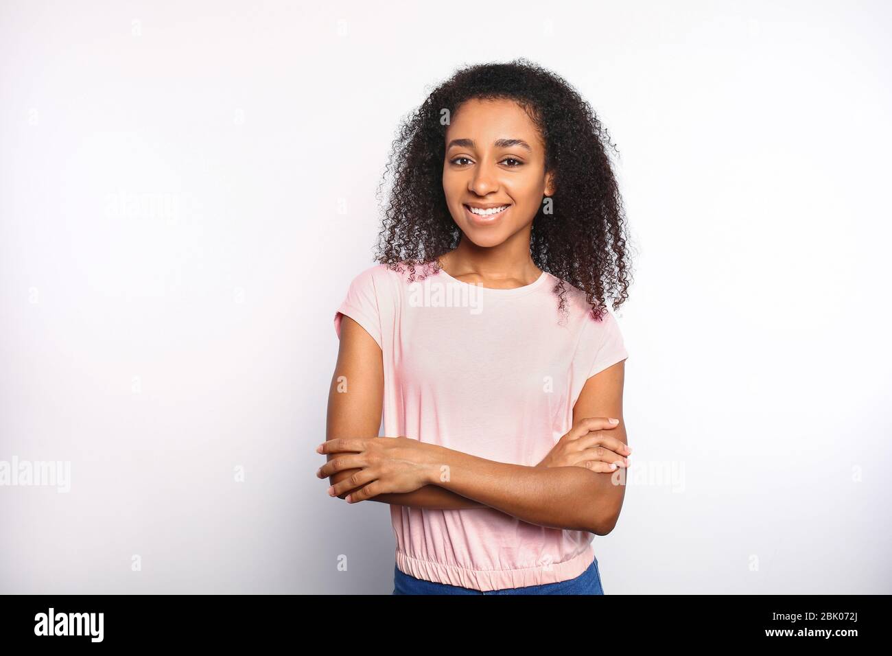 Portrait of beautiful African-American woman on white background Stock ...