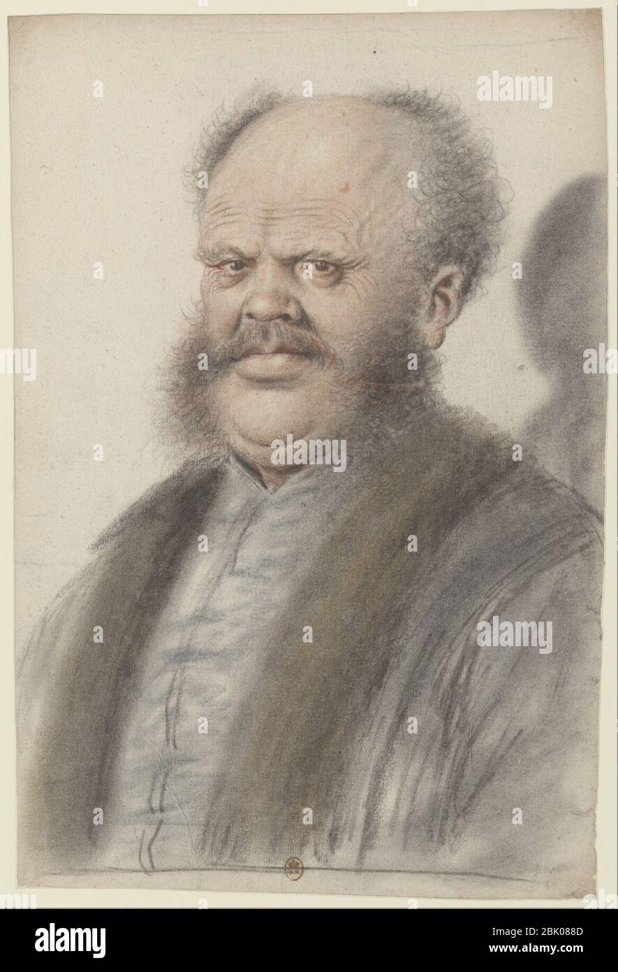 Homme au crâne dégarni, portant moustaches et larges pattes de cheveux descendant sur les joues, vu presque de face (Nicolas Lagneau). Stock Photo
