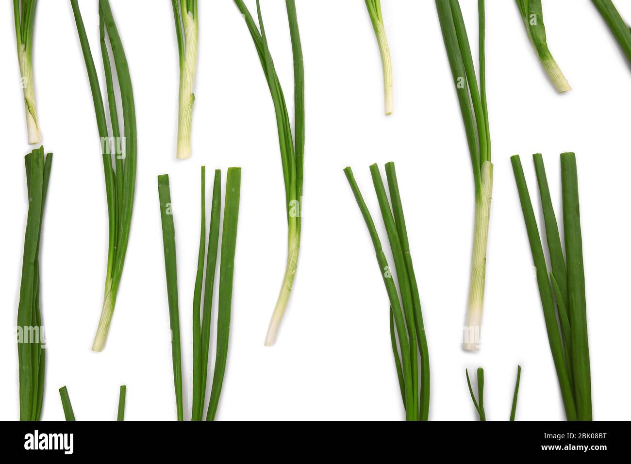 Fresh green onion on white background Stock Photo - Alamy