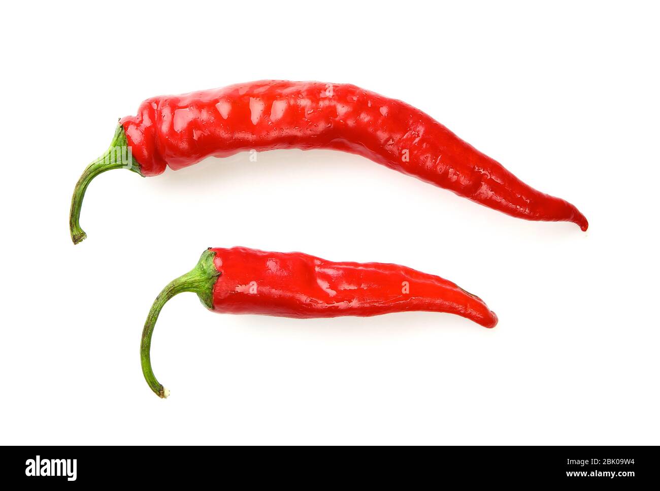 Red chili peppers on white background Stock Photo - Alamy