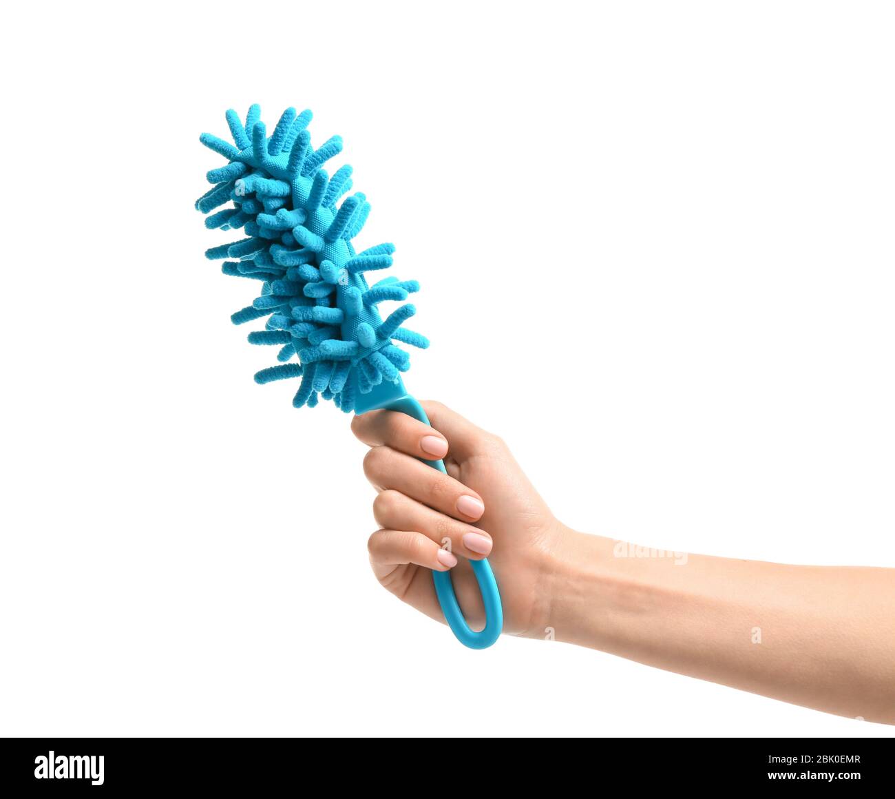 Female hand holding dust brush on white background Stock Photo - Alamy