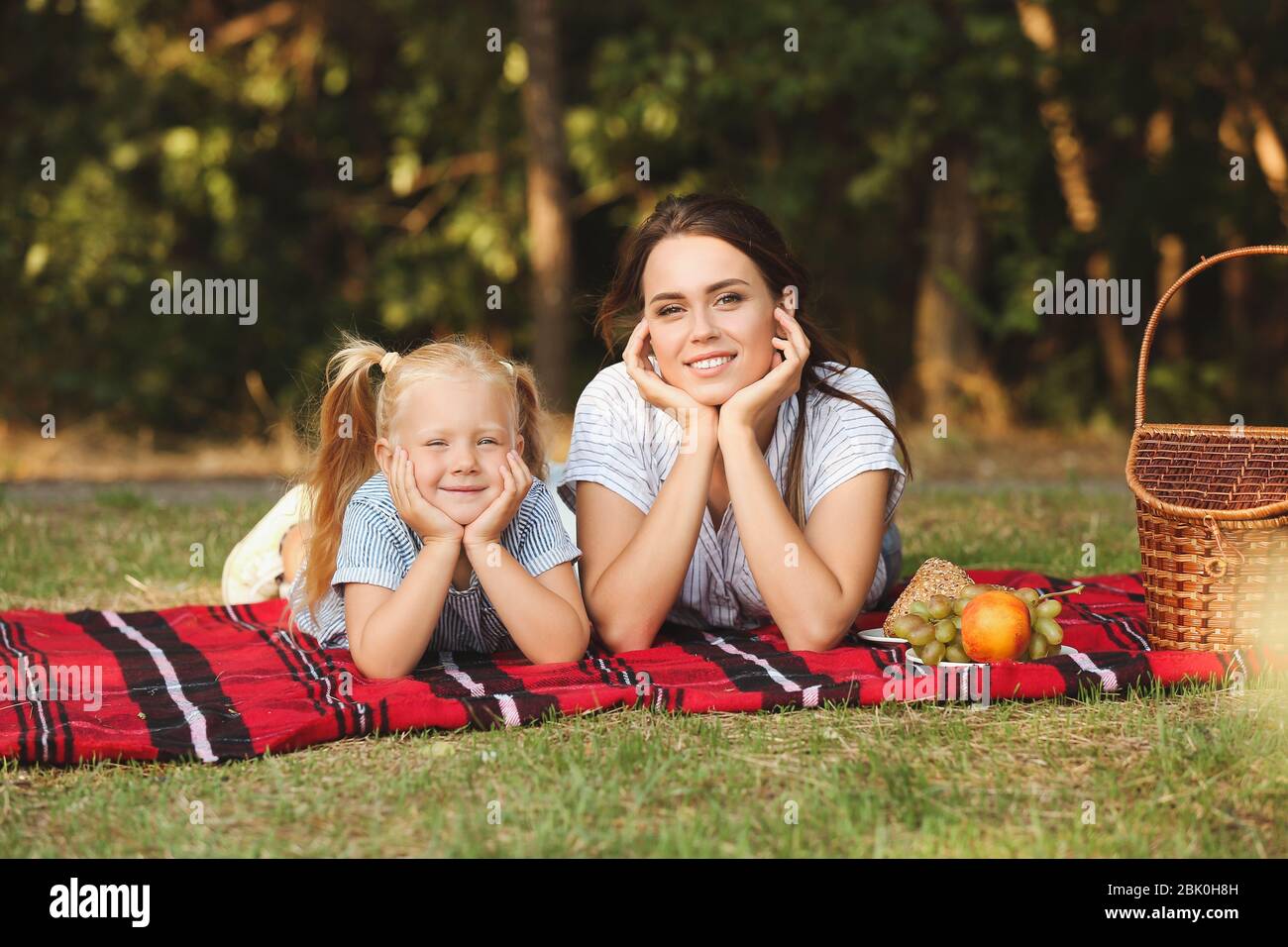 Happy mother and daughter at picnic outdoors Stock Photo - Alamy