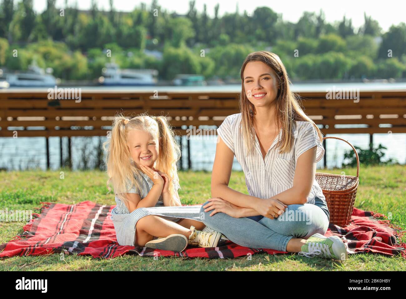 Happy mother and daughter at picnic outdoors Stock Photo - Alamy