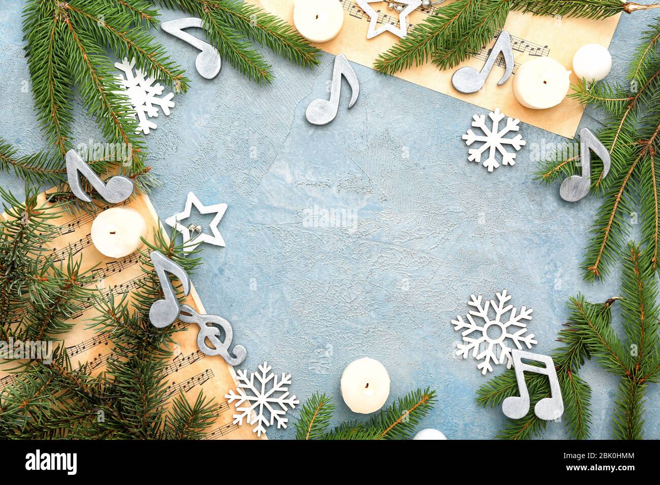 Composition with note sheets, Christmas decor and place for text on grey background Stock Photo