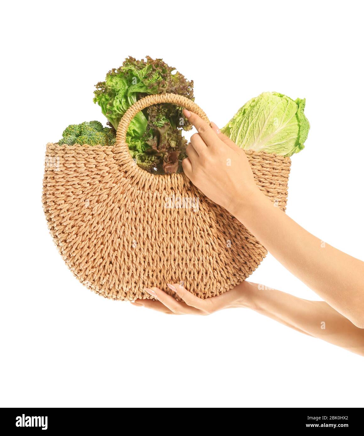 Female hands with fresh vegetables in eco bag on white background Stock ...