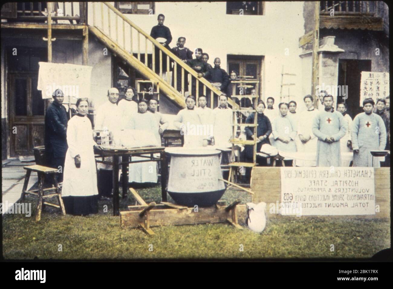 Hospital staff, volunteers, and apparatus during the Changteh cholera epidemic, Changde, Hunan, China, ca.1910-1919 (IMP-YDS-RG008-358-0008-0078). Stock Photo