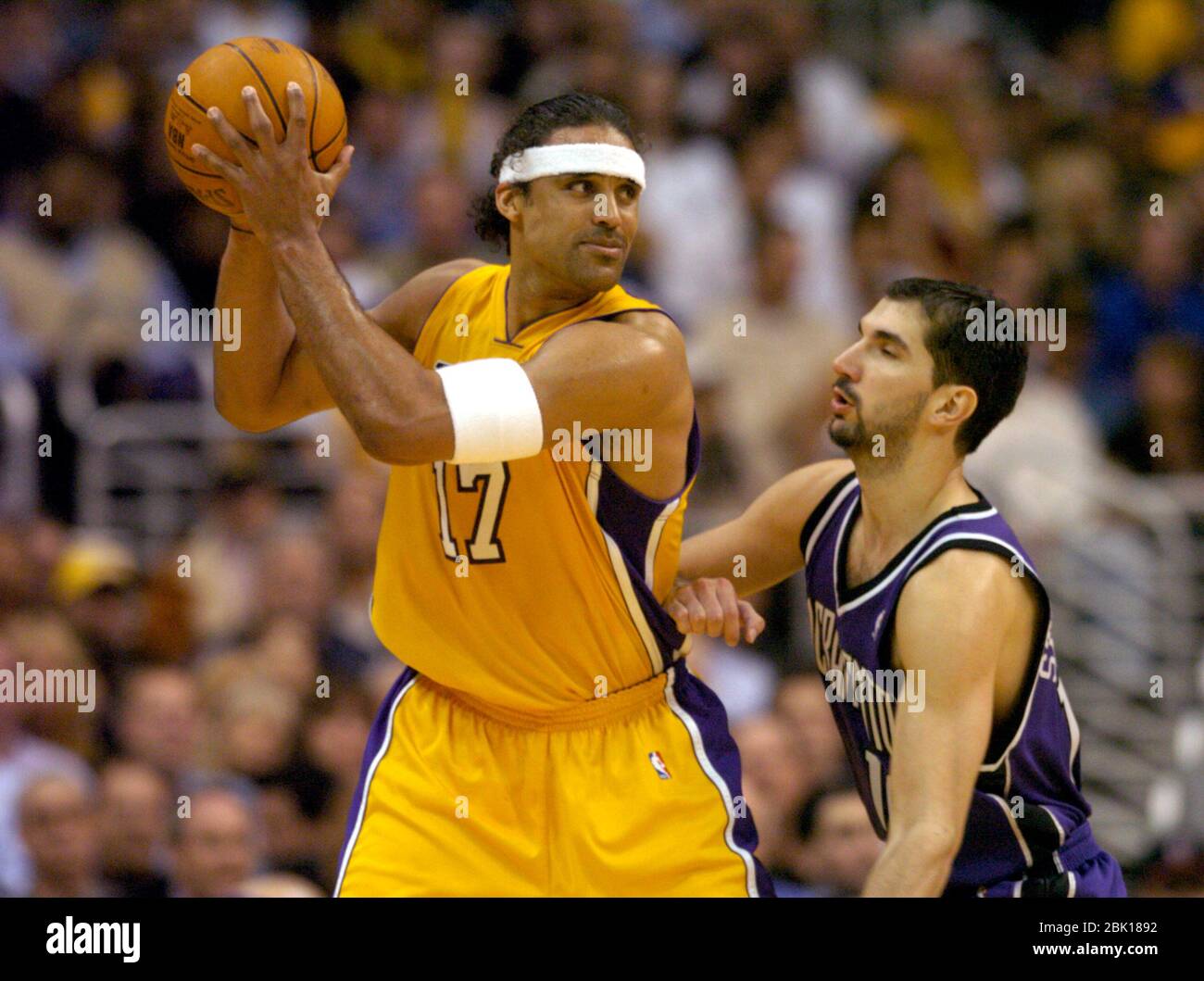 Rick Fox - Name the former NLC player trying to block my shot?