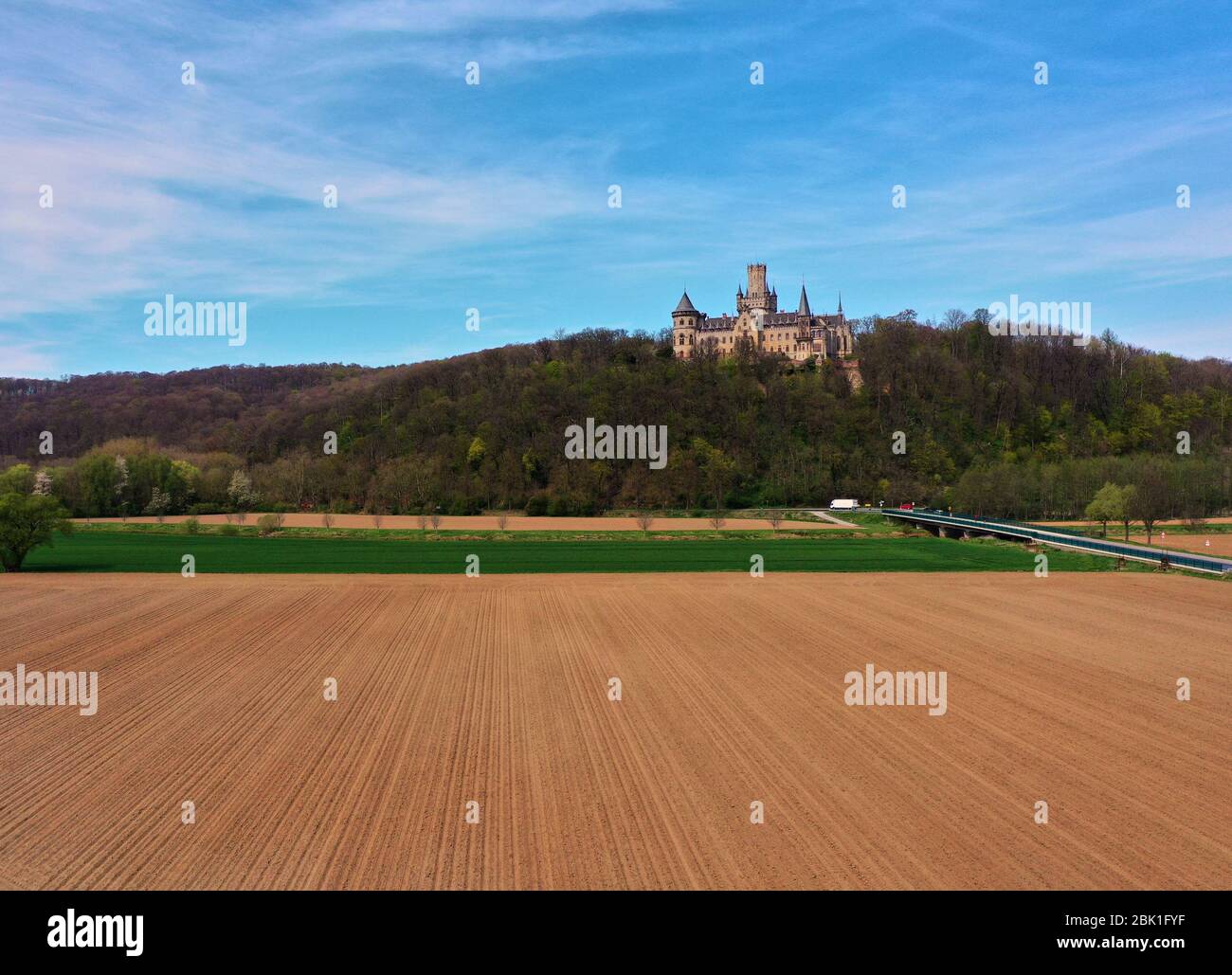 Aerial view over fields, meadows and the river Leine to Marienburg Castle near Hannover Stock Photo