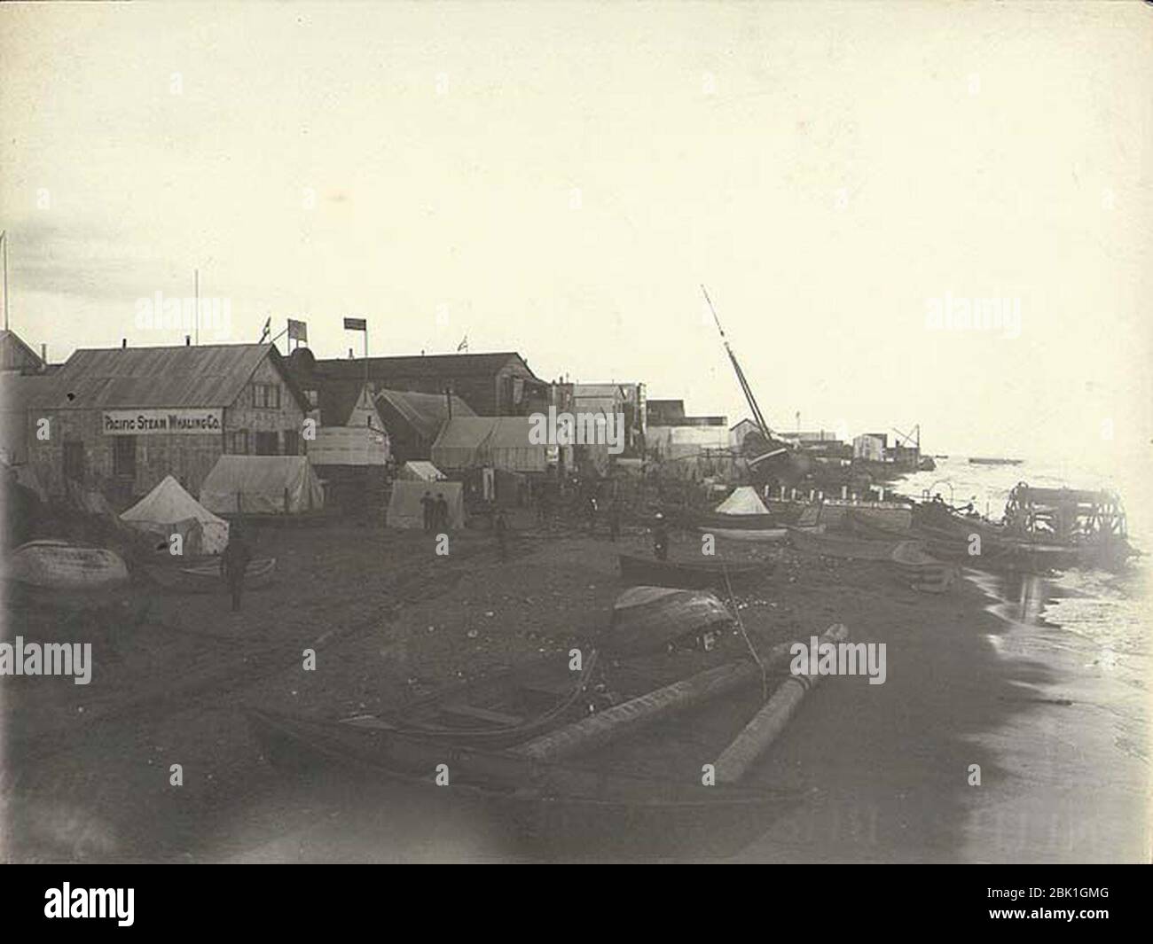 Houses tents and boats on the beach Nome Alaska ca 1900 (HESTER 160
