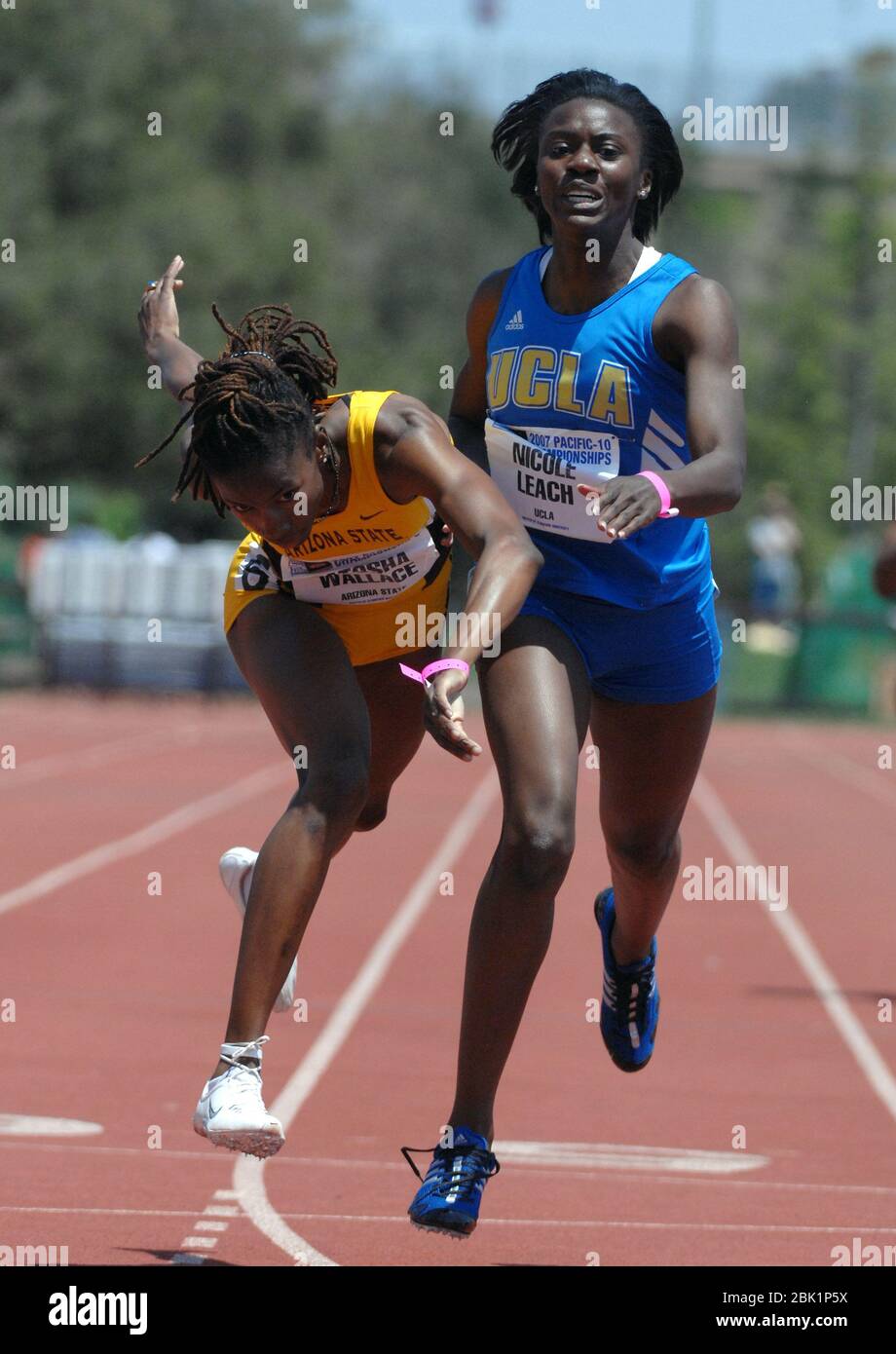 2007 pacific girls  Stanford, United States. 13th May, 2007. LaTosha Wallace of Arizona State,  left, and Nicole Leach of UCLA lean at the finish of the women's 400 meters  in the Pacific-10 Conference Track &