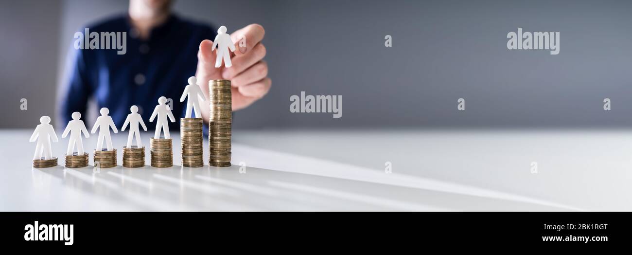 Minimum Wage Salary Compensation And Insurance Coins Stock Photo