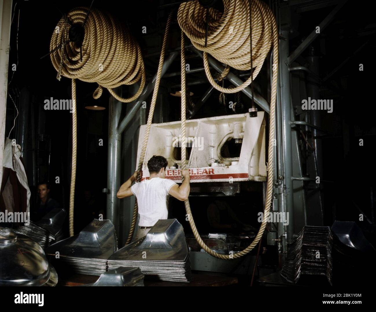 Huge drop hammers work day and night forming sheet metal parts for