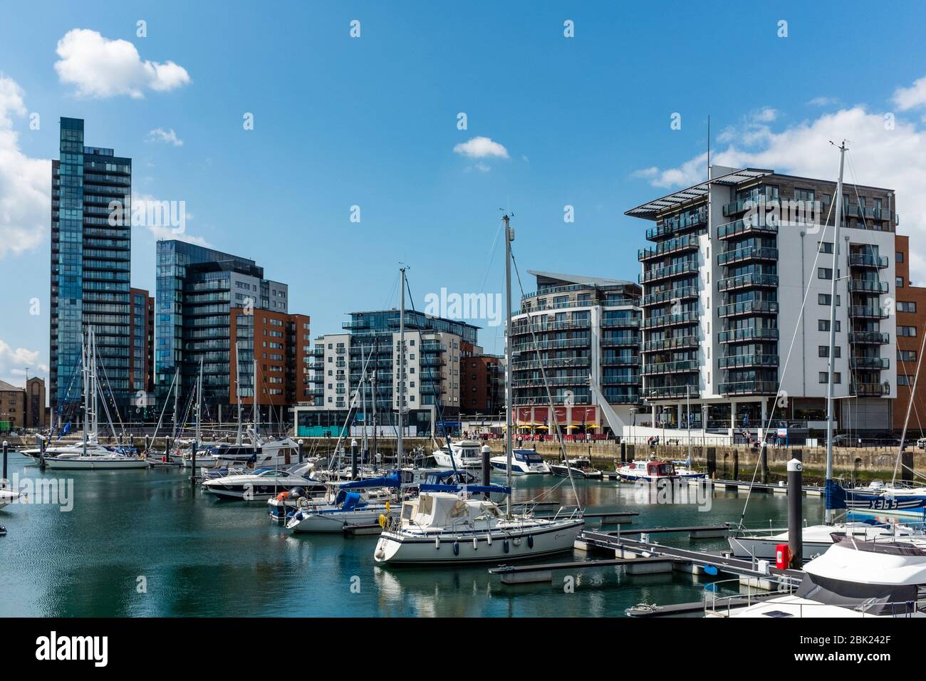 Ocean Village with modern apartments building by marina, Southampton