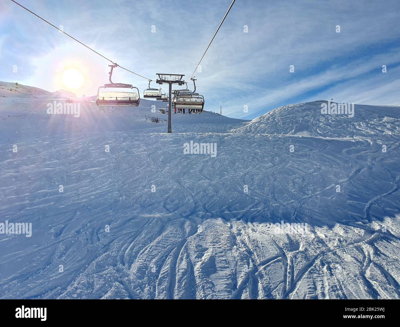 chairlift ski snowy mountains winter Nature Stock Photo