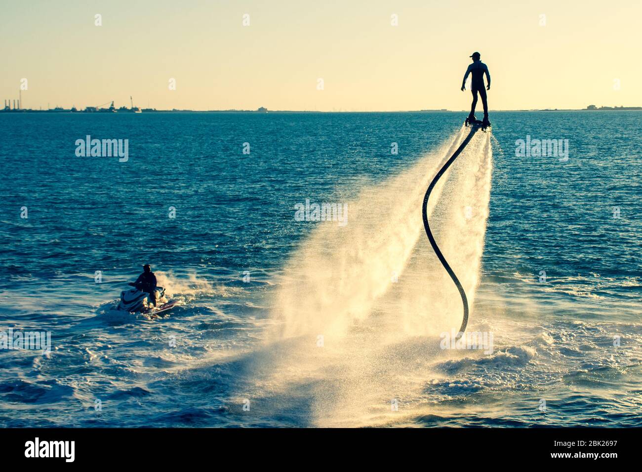 Fly boarding spinning extreme water sports with jet ski in Ras al Khaimah, United Arab Emirates