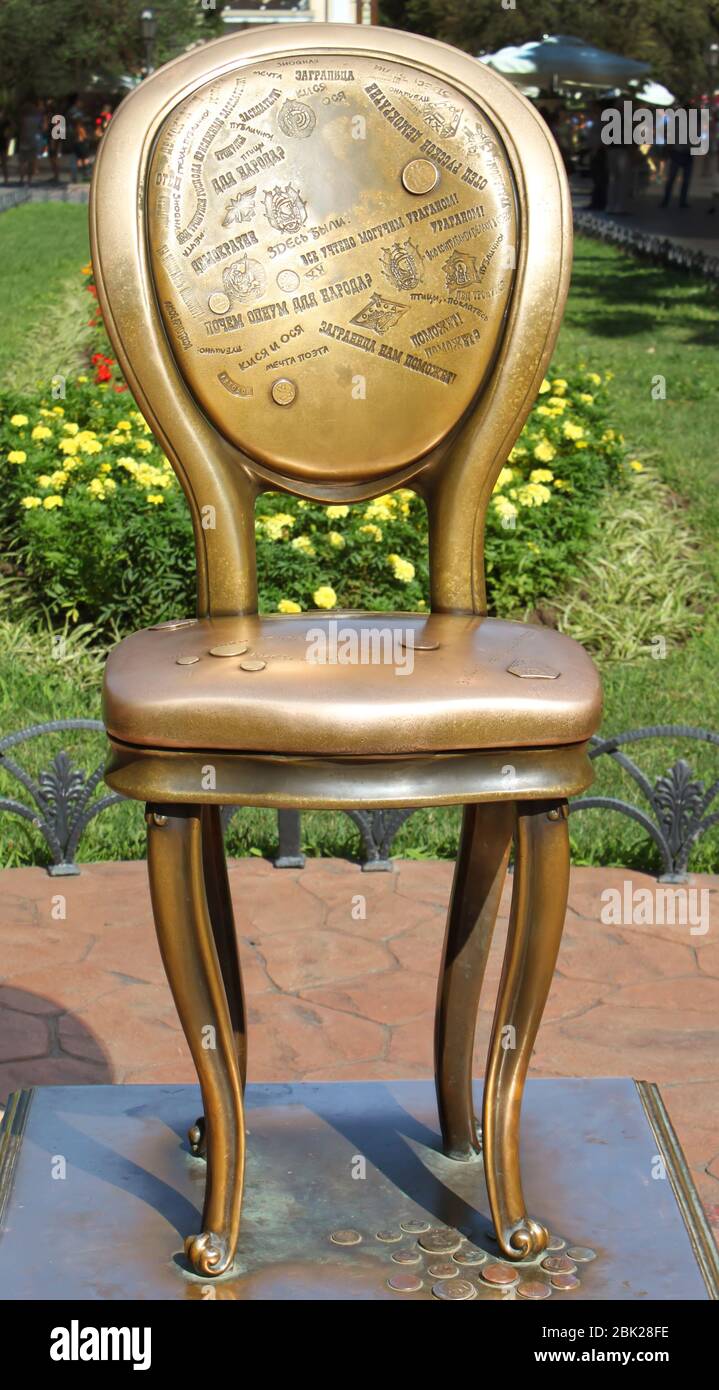 ODESSA, UKRAINE  MARCH 24, 2013: Monument for famous book 'Twelve chairs'. It is s a classic satirical novel by the Odessan Soviet authors Stock Photo