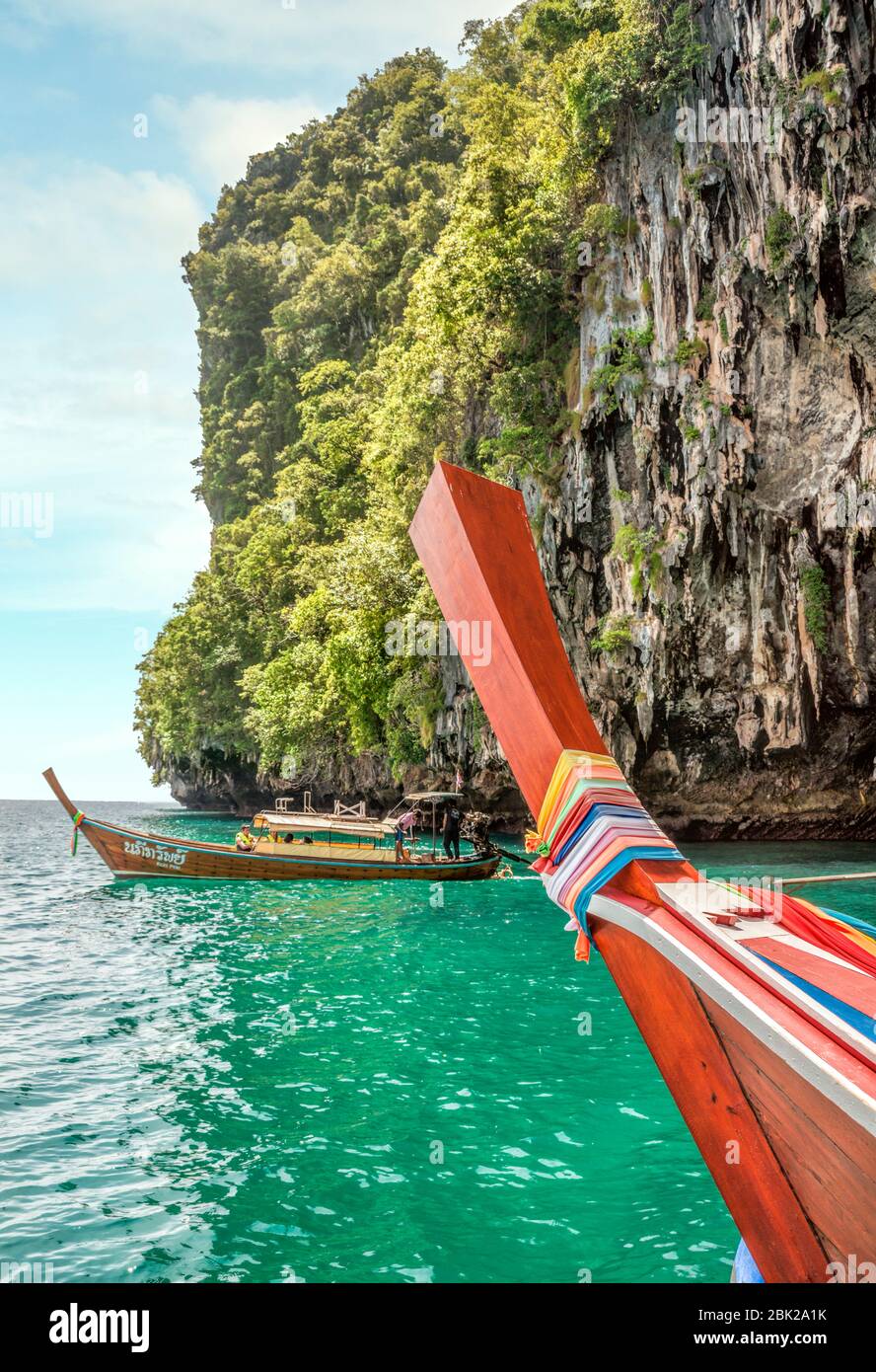 Thai long tail boats at Koh Ma near Koh Lanta, Krabi, Thailand Stock Photo
