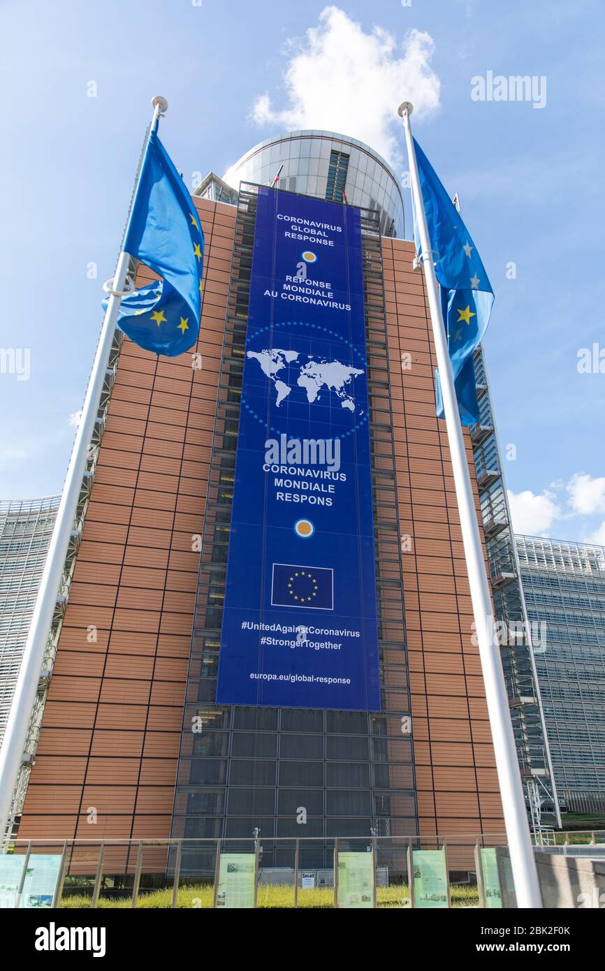 BRUSSELS, Belgium - fourth of may 2020 : The 'Coronavirus - Global Response' banner displayed on the front of the Berlaymont building, the headquarter Stock Photo