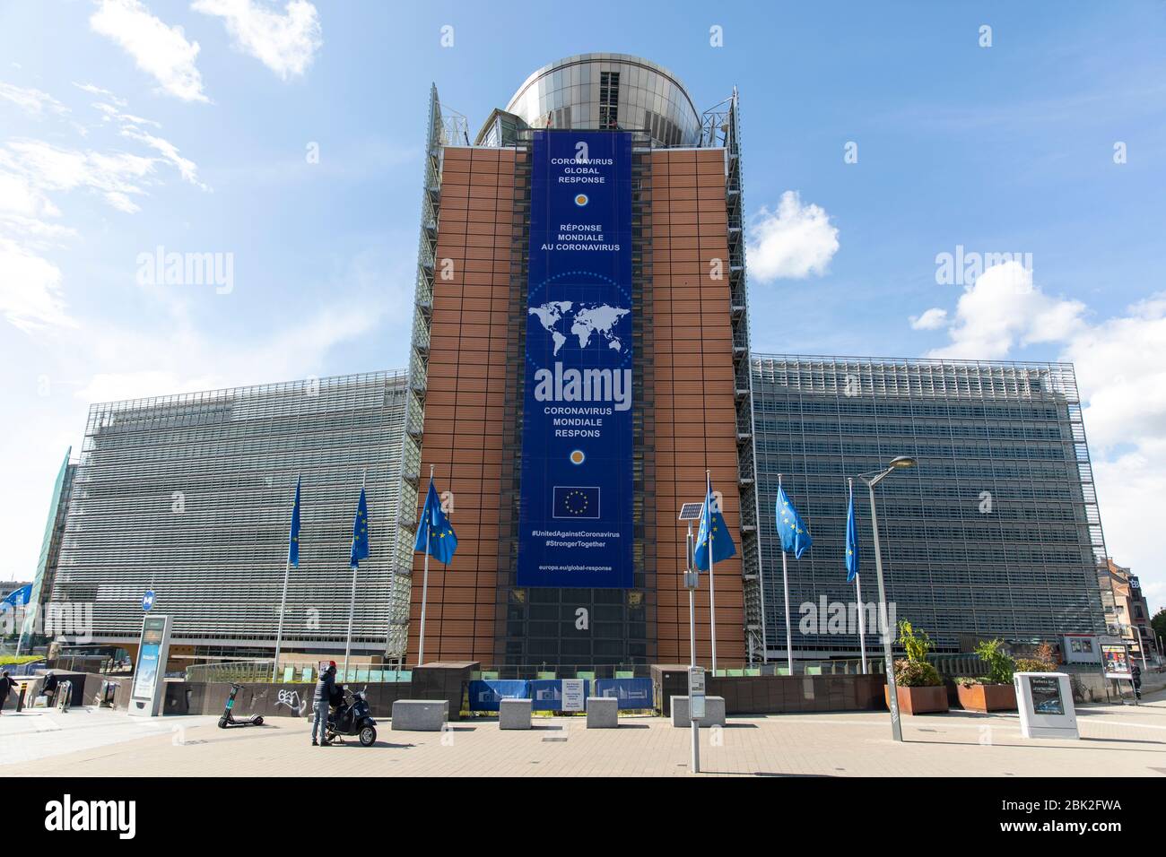 BRUSSELS, Belgium - fourth of may 2020 : The 'Coronavirus - Global Response' banner displayed on the front of the Berlaymont building, the headquarter Stock Photo