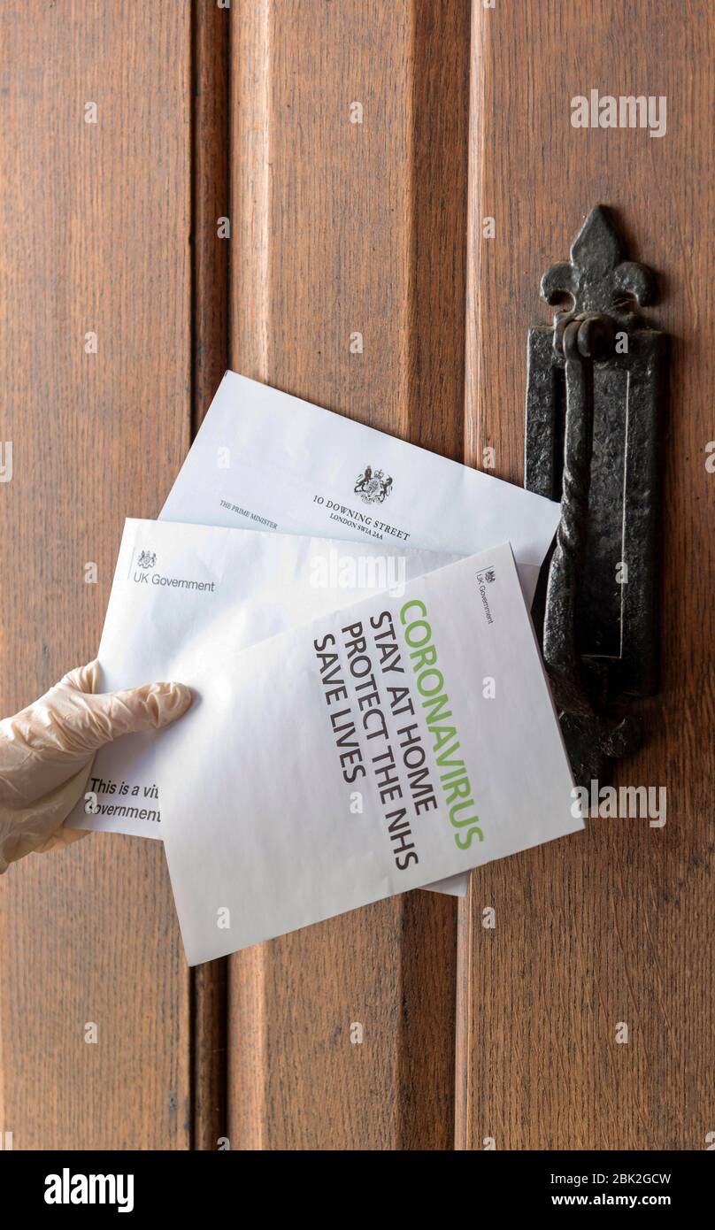 Hampshire, UK. 2020. Home delivery of government communication on Coronavirus Stock Photo