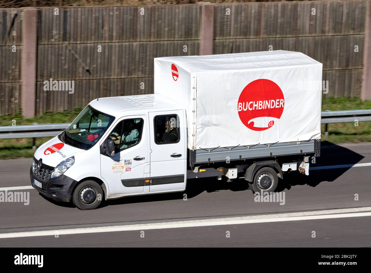 Renault Master of Buchbinder on motorway. Buchbinder is a German car rental company and part of