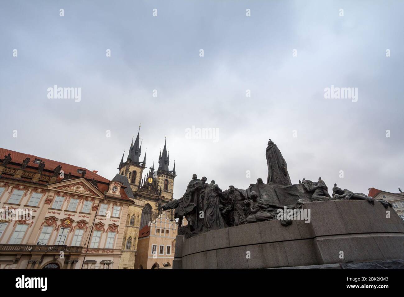 Jan Hus Memorial, on Staromestske Namesti, the Old Town Square of Prague, Czech Republic, with the church of our lady before tyn in backgroud, a major Stock Photo