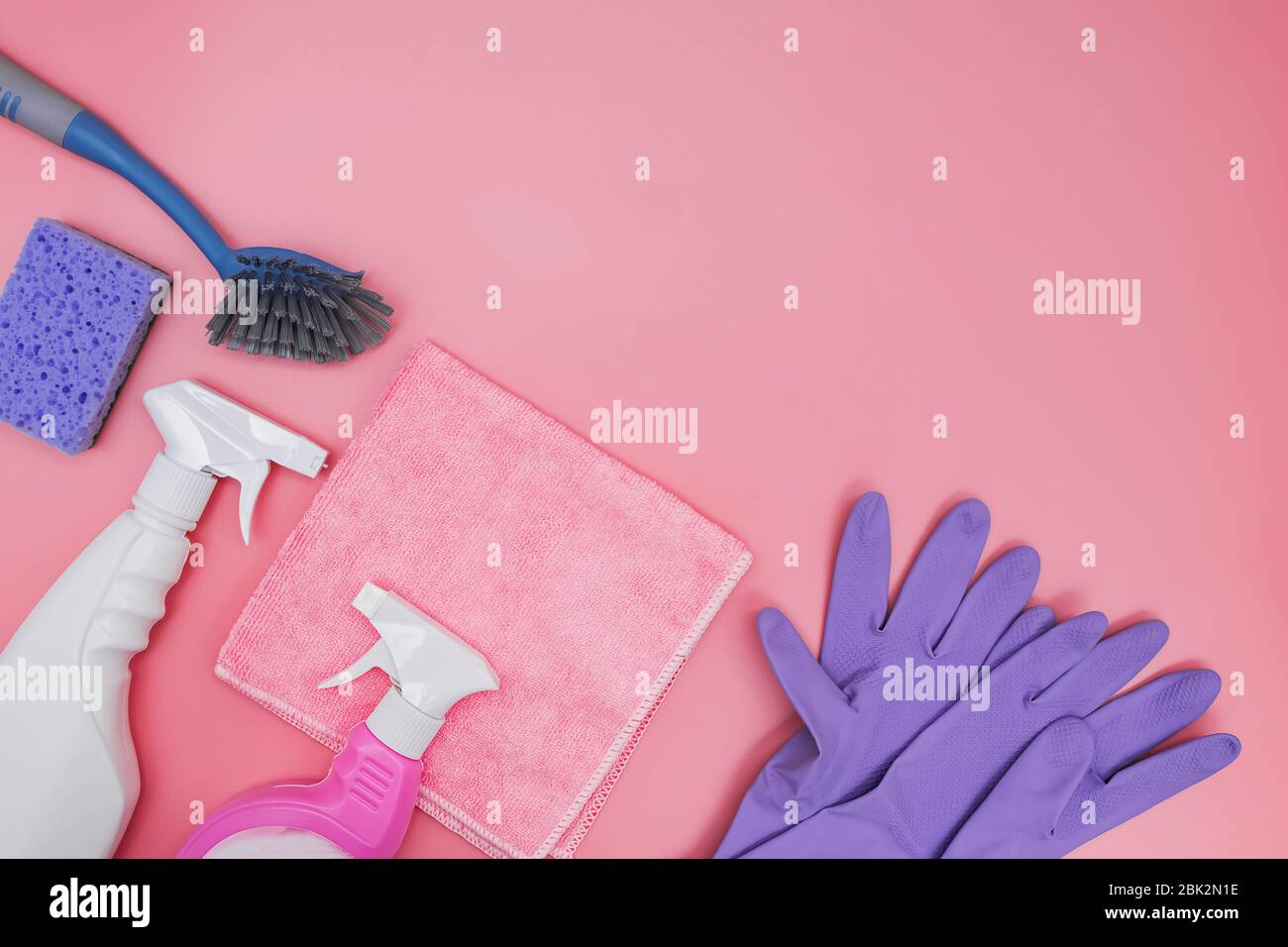 https://c8.alamy.com/comp/2BK2N1E/flat-lay-composition-with-cleaning-supplies-on-wooden-background-2BK2N1E.jpg