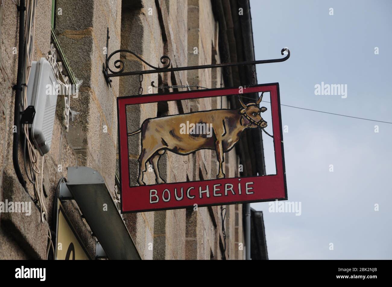 Illustrated butcher's shop sign in the historic Breton town of Moncontour Stock Photo