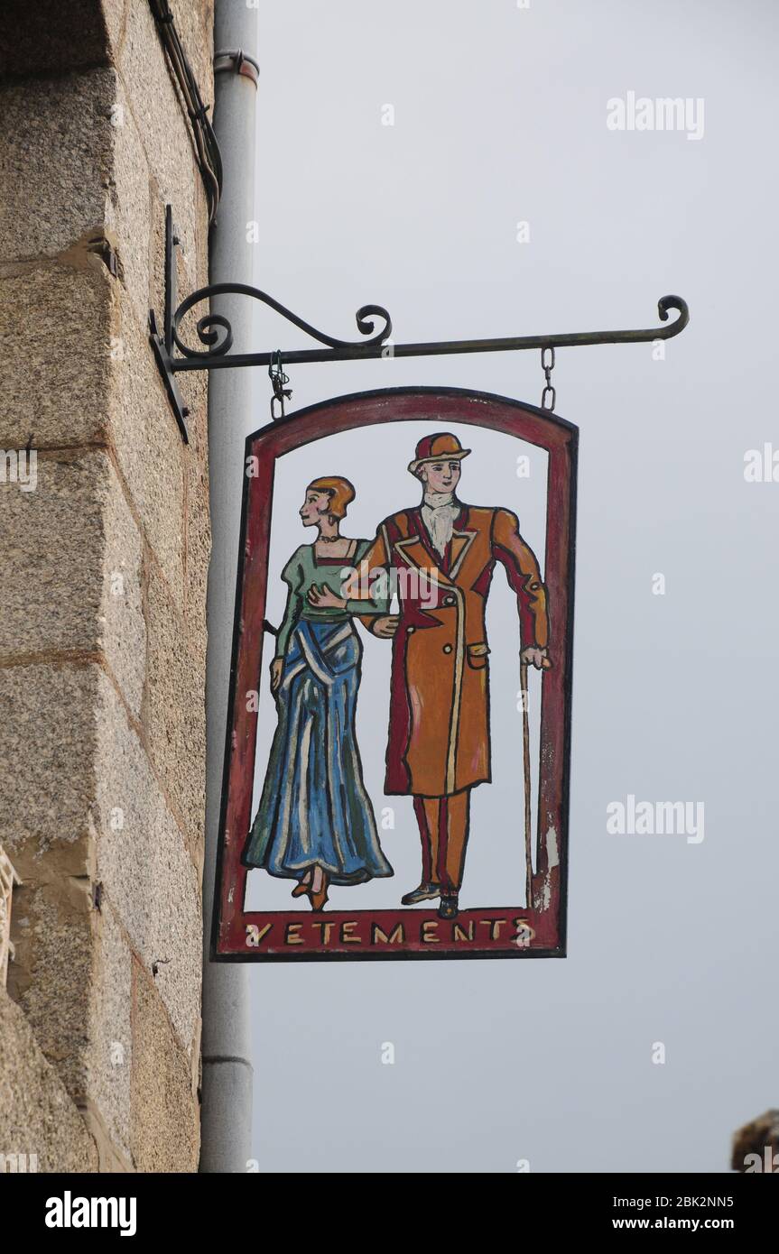 Illustrated clothing shop sign in the historic Breton town of Moncontour Stock Photo